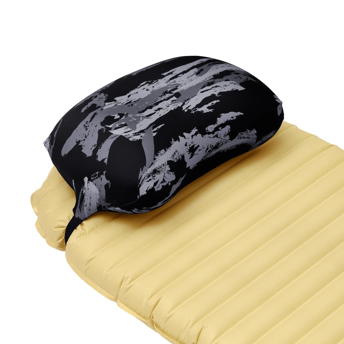 Pillow Strap Small size camping pillow case in Night Shadows on a sleeping pad. Three quarter view.