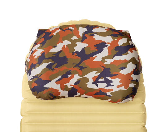 Pillow Strap medium size camping pillow case in forest camo on a sleeping pad. Overhead image.