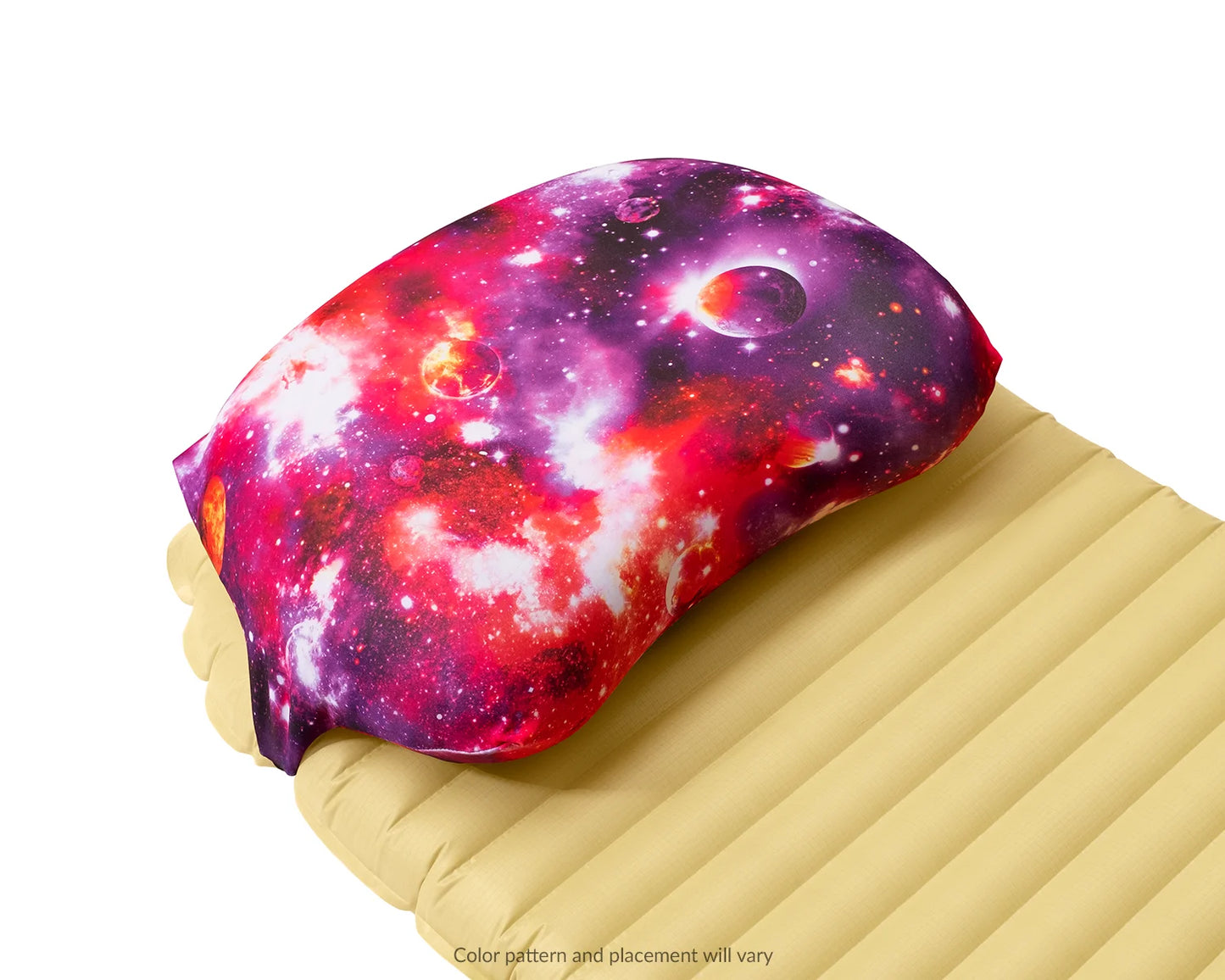 Pillow Strap medium size camping pillow case in galaxy on a sleeping pad. Three quarter view.
